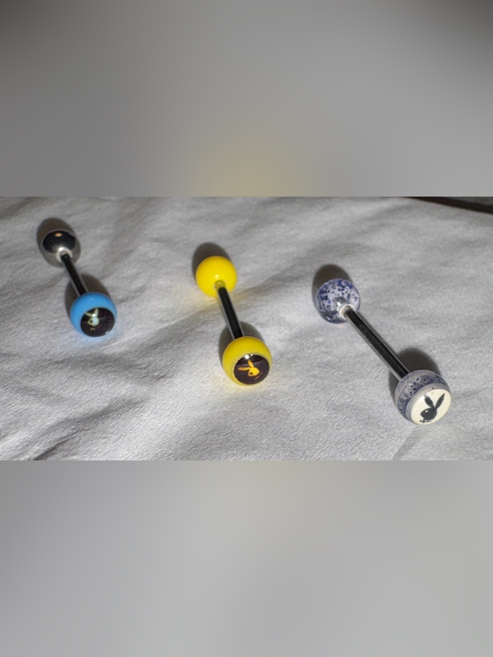 Playboy tongue barbell with a surgical steel shaf body jewelry - NEW